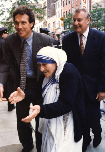Sean Callahan, left, with Mother Teresa during her 1996 visit to CRS Headquarters. Photo courtesy of Catholic Relief Services