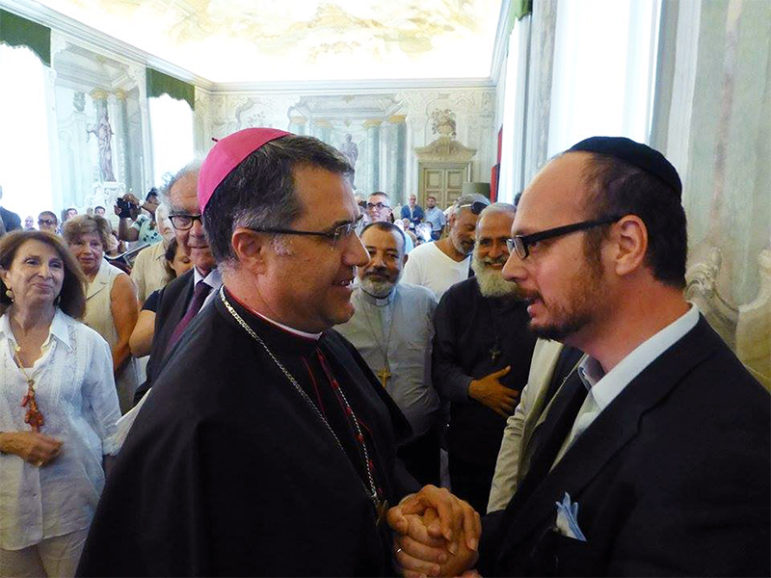 Palermo Archbishop Corrado Lorefice, left, meets Rabbi Pinhas Punturello, Shavei Israel’s emissary to Sicily, Italy.  Photo courtesy of Shavei Israel