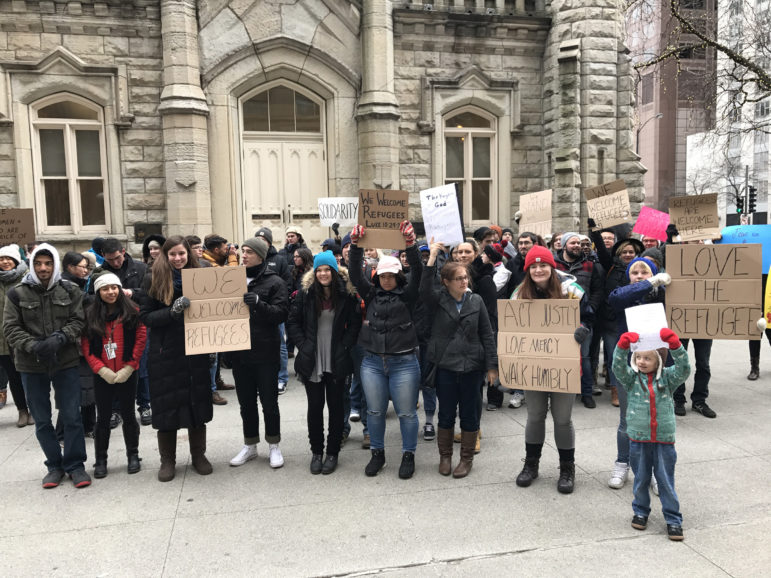 People demonstrate in solidarity with refugees in a march organized by Moody Bible Institute faculty and students that ended at the Chicago Water Tower on Feb. 4, 2017. Photo courtesy of Craig Hendrickson
