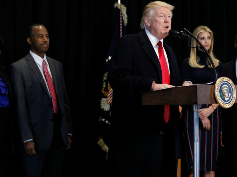 President Trump is flanked by Ben Carson, his nominee to lead the Department of Housing and Urban Development, and Trump's daughter Ivanka Trump as he delivers remarks after visiting the National Museum of African American History and Culture on the National Mall in Washington on Feb. 21, 2017. Reuters/Jonathan Ernst