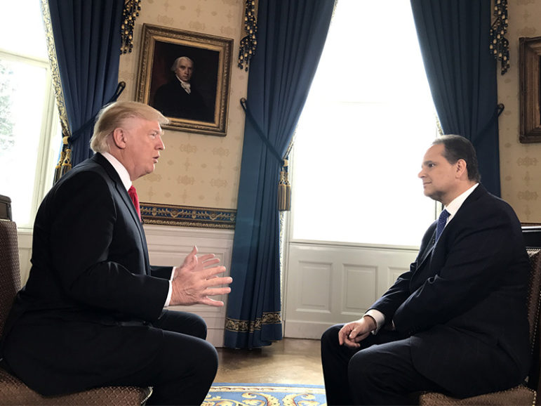 Christian Broadcasting Network chief political correspondent David Brody, right, interviews President Trump at the White House. Photo courtesy of Mark Bautista/CBN News