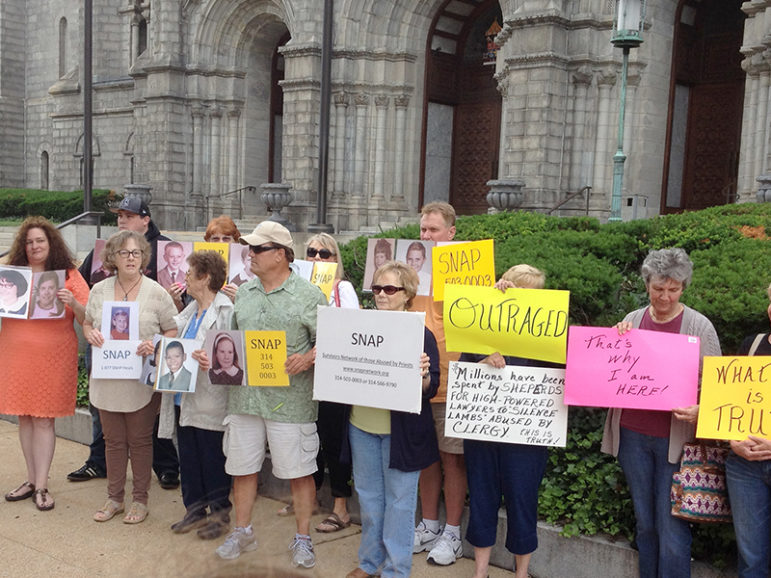 Catholics and sexual abuse survivors protest in front of the Cathedral Basilica of St. Louis on June 11, 2014. The group gathered in response to a deposition given by St. Louis Archbishop Robert Carlson. Photo courtesy Barb Dorris/SNAP