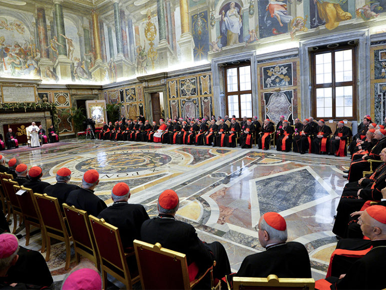 Pope Francis talks to the Curia in the Clementina Hall at the Vatican on Dec. 22, 2014. (AP Photo/Andreas Solaro, Pool) 