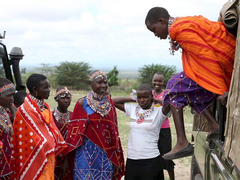 Maasai girls arrive for the start of a social event advocating against harmful practices such as female genital mutilation at the Imbirikani Girls High School in Imbirikani, Kenya, on April 21, 2016. Photo courtesy of Reuters/Siegfried Modola
*Editors: This photo may only be republished with RNS-FGM-KENYA, originally transmitted on Feb. 6, 2017.