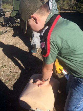 A Trailman learning CPR during the troop's October 2016 campout in Denton, Texas. Photo courtesy of Trail Life Troop TX-0191