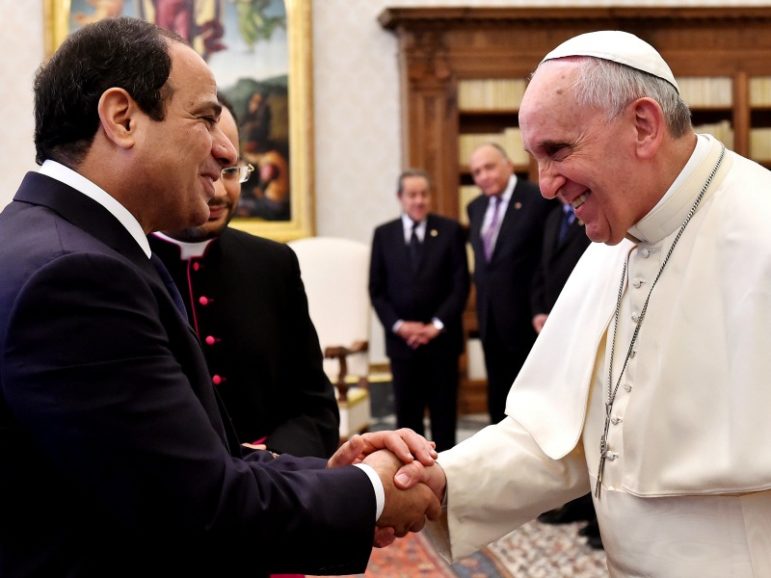 Pope Francis and Egypt's President Abdel Fattah al-Sisi shake hands Nov. 24, 2014, during a private audience at the Vatican. Photo by Gabriel Bouys/Pool/File Photo/REUTERS