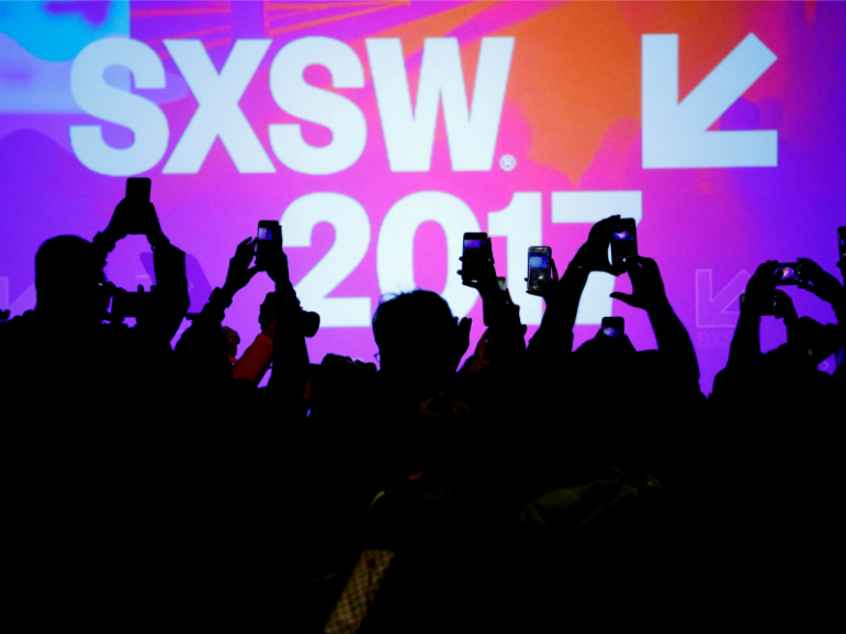 Audience members use their mobile phones to take photographs of former Vice President Joe Biden on March 12, 2017, at the South by Southwest (SXSW) Music Film Interactive Festival 2017 in Austin, Texas. Photo by Brian Snyder/REUTERS