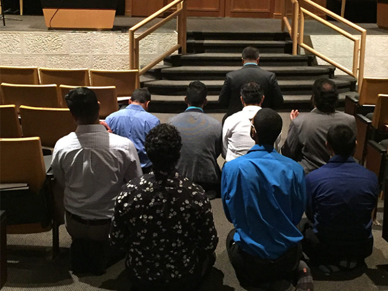 Muslims offering the evening prayer at Temple Solel in Hollywood, Fla. RNS photo by Jeffrey Salkin
