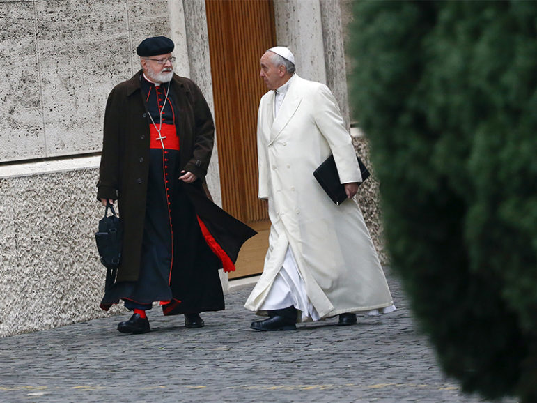 Pope Francis talks with Cardinal Sean Patrick O'Malley, left as they arrive for a consistory at the Vatican on Feb. 13, 2015. Photo courtesy of Reuters/Tony Gentile