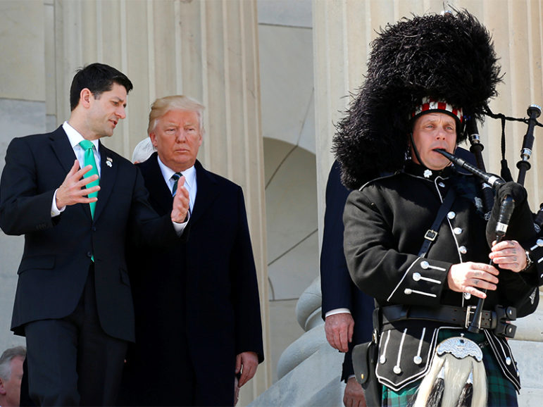 Speaker of the House Paul Ryan, left, and U.S. President Donald Trump follow a piper down the steps after they attended the annual Friends of Ireland St. Patrick’s Day lunch at the U.S. Capitol in Washington, D.C., on  March 16, 2017. Photo courtesy of Reuters/Kevin Lamarque
