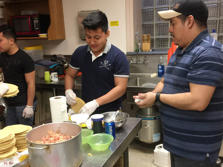 Men prepare food for a Mexican Taqueria sponsored by Pilgrim-St. Luke's and El Nuevo Camino United Church of Christ in Buffalo, N.Y., in November 2016. Photo courtesy of the Rev. Justo Gonzalez II