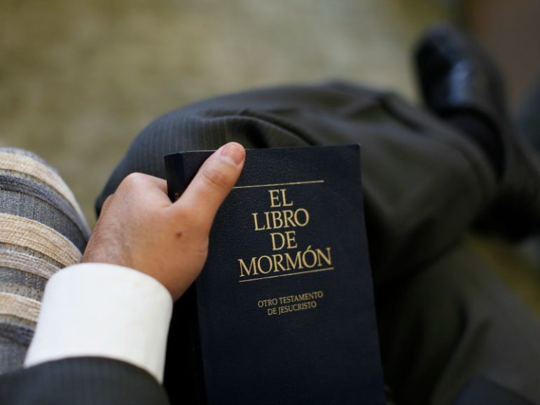A Mormon holds a copy of The Book of Mormon during an interview with Reuters at the missionary training center of the Temple of the Church of Jesus Christ of Latter-Day Saints Feb. 23, 2012, at the Aragon neighborhood in Mexico City. The strongest growth for the Church of Jesus Christ of Latter-day Saints in recent years has come overseas, and one of its richest source of recruits in the United States is the Hispanic community. Picture taken Feb. 23, 2012. Photo by Tomas Bravo/REUTERS