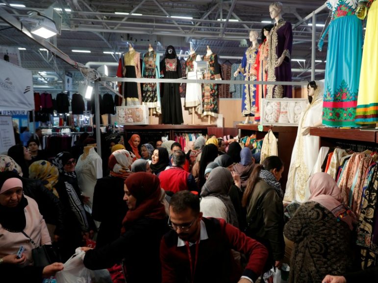 A stand displays women's clothes during the 34th annual meeting of French Muslims, the cultural and festive event organized by the Union of Islamic Organizations of France (UOIF) April 14, 2017, at Le Bourget, near Paris. Photo by Philippe Wojazer/REUTERS