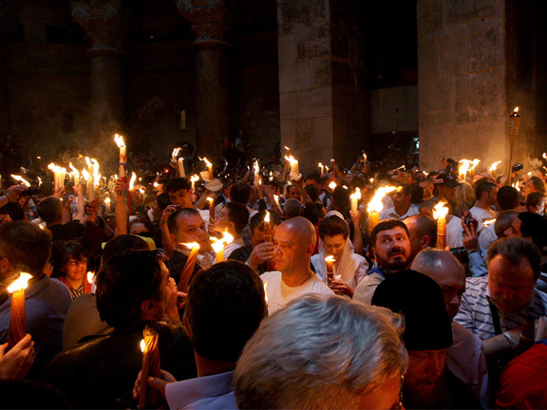 Orthodox Christians participate in the Holy Fire ceremony at the Church of the Holy Sepulchre in Jerusalem in 2012.  Photo courtesy of St. Andrew the First-Called Foundation