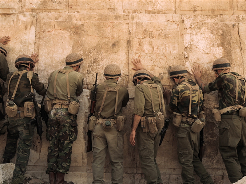 Soldiers pray at the Western Wall in a scene from the movie “In Our Hands: The Battle for Jerusalem.” Photo courtesy of CBN