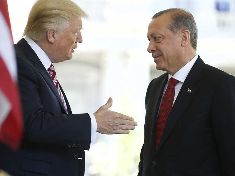 President Trump talks with Turkey's President Recep Tayyip Erdogan as he arrives at the entrance to the West Wing of the White House in Washington, D.C., on May 16, 2017. Photo courtesy of Reuters/Joshua Roberts