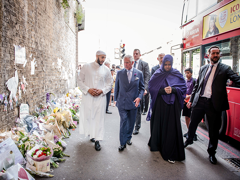 Britain's Prince Charles visits the tributes left at the scene of the Finsbury Mosque attack alongside Imam Mohammed Mahmoud on June 21, 2017. Mahmoud protected the attacker after the incident. Photo courtesy of Reuters/John Nguyen/Pool
