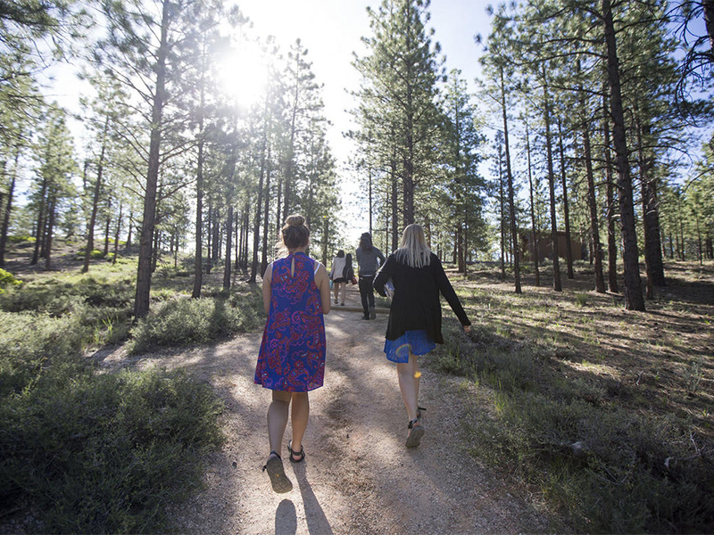 Gabi Sheeley, Eric Meeks, Meleeza Hall and Amy Auble walk to an outdoor amphitheater to lead a nondenominational Christian church service in Bryce Canyon National Park on June 18, 2017. Photo courtesy of Deseret News/Kelsey Brunner