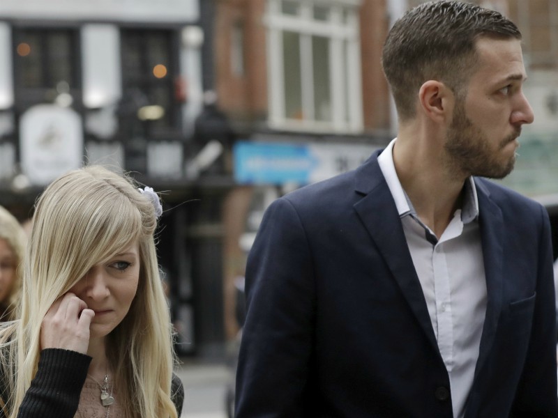 The parents of critically ill baby Charlie Gard, Connie Yates and Chris Gard, arrive at the High Court in London on July 24, 2017. The parents of the 11-month old, who has a rare genetic condition and brain damage, are returning to court for the latest stage in their effort to seek permission to take the child to the United States for medical treatment. (AP Photo/Matt Dunham)