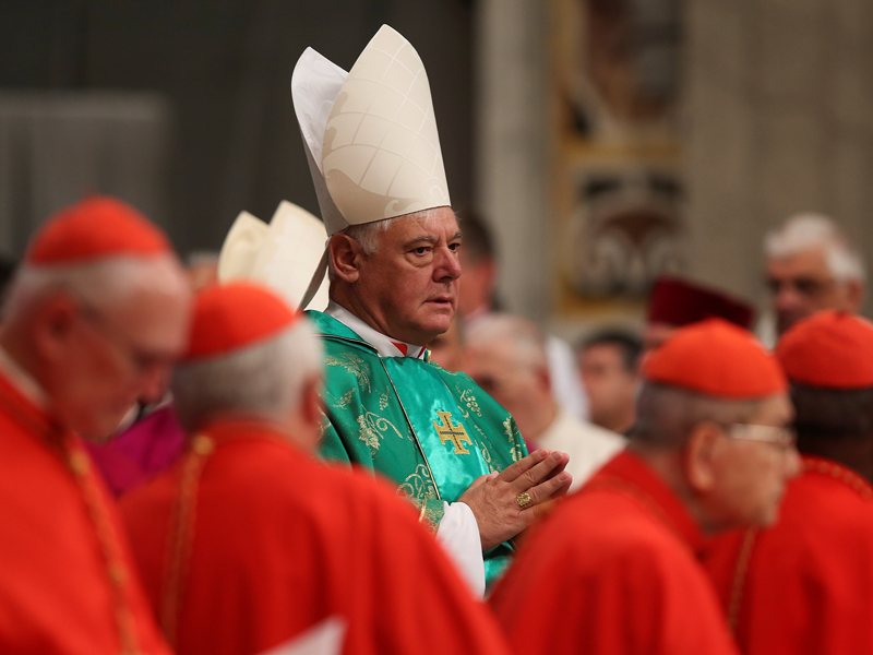 Newly elected Cardinal Gerhard Ludwig Muller of Germany arrives during a consistory ceremony led by Pope Francis in St. Peter's Basilica at the Vatican on Feb. 22, 2014. Photo courtesy of Reuters/Alessandro Bianchi