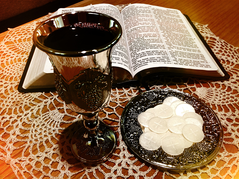 Communion wafers and wine. Photo courtesy of Creative Commons/John Snyder
