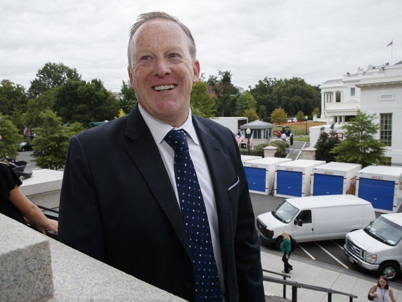 In this Aug. 11, 2017, file photo, former White House press secretary Sean Spicer walks up the steps of the Eisenhower Executive Office Building adjacent to the White House in Washington. Spicer finally got to meet Pope Francis; Vatican spokesman Greg Burke confirms Spicer attended a meeting with Francis on Aug. 27, 2017. (AP Photo/J. Scott Applewhite)