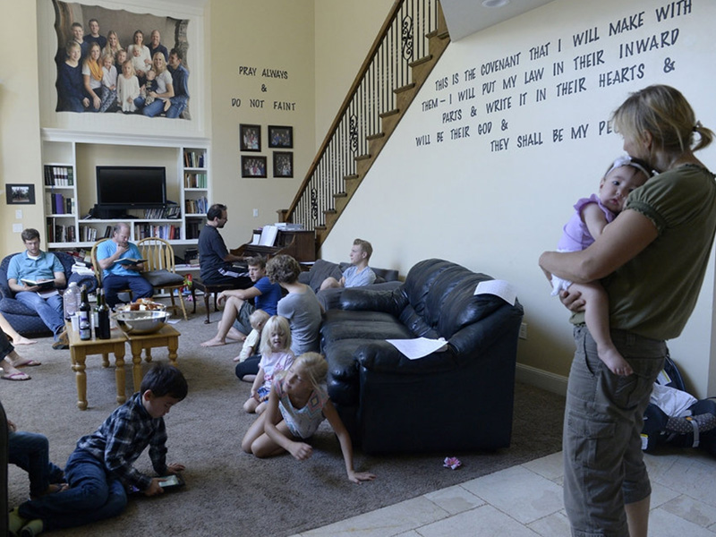 Believers in Denver Snuffer's Remnant movement gather in a Sandy, Utah, home for a fellowship meeting on Aug. 13, 2017, to sing songs and partake of the sacrament. (Al Hartmann | The Salt Lake Tribune)