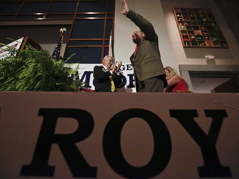 Former Alabama Chief Justice and U.S. Senate candidate Roy Moore waves to the crowd during his election party Sept. 26, 2017, in Montgomery, Ala. Moore won the Alabama Republican primary runoff for U.S. Senate, defeating an appointed incumbent backed by President Trump and allies of Sen. Mitch McConnell. (AP Photo/Brynn Anderson)