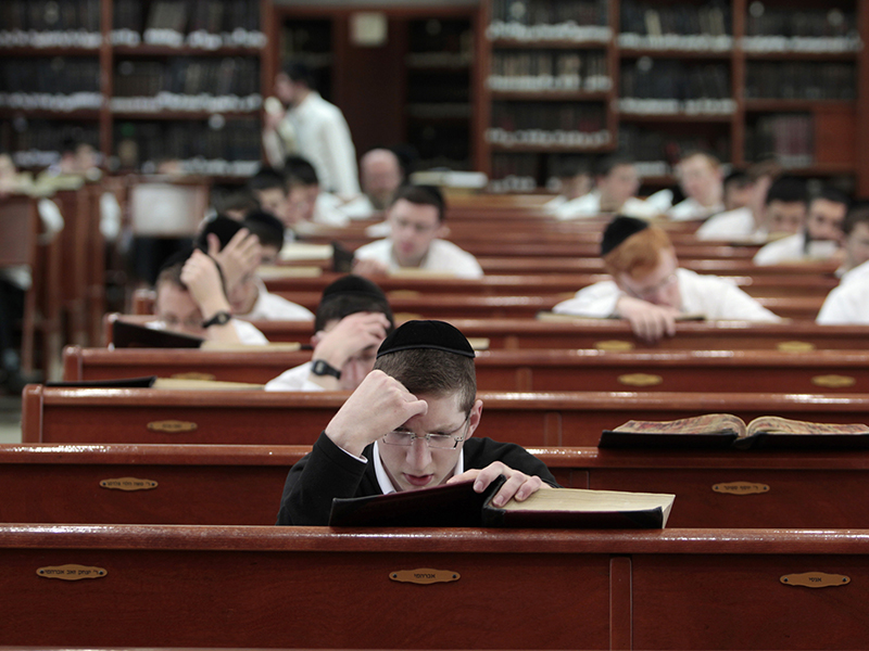 Ultra-Orthodox Jewish youths study religious texts at a synagogue in Jerusalem on April 7, 2011. Ultra-Orthodox Jews, or 