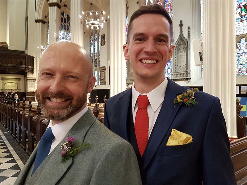 The first same-sex wedding in an Anglican church in the U.K. took place when Peter Matthews and Alistair Dinnie married one another at St. John's Church in Edinburgh on September 16, 2017, after the Scottish Episcopal Church overturned the Anglican canon law stipulation that marriage must be between a man and a woman in a vote in June. Photo courtesy of St John's Choir/Twitter‏ @stjohnschoir