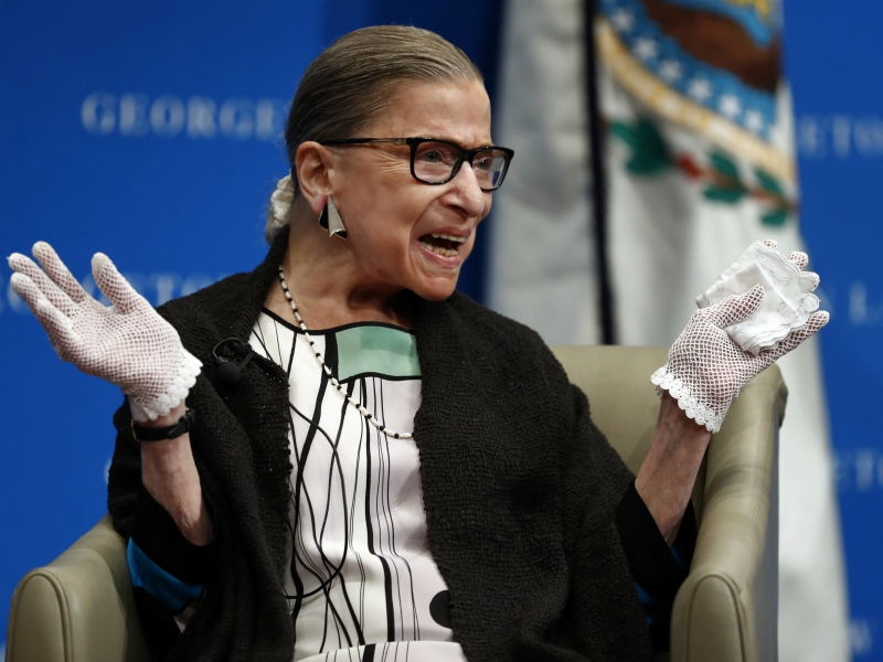 U.S. Supreme Court Justice Ruth Bader Ginsburg reacts to applause as she is introduced by William Treanor, dean and executive vice president of Georgetown University Law Center, at its campus in Washington, on Sept. 20, 2017. (AP Photo/Carolyn Kaster)