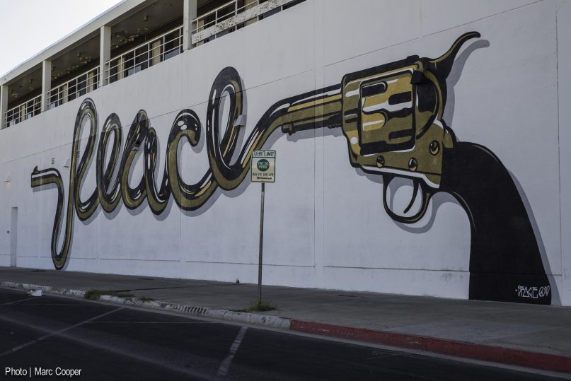 A wall mural in downtown Las Vegas transforms a pistol into the word 