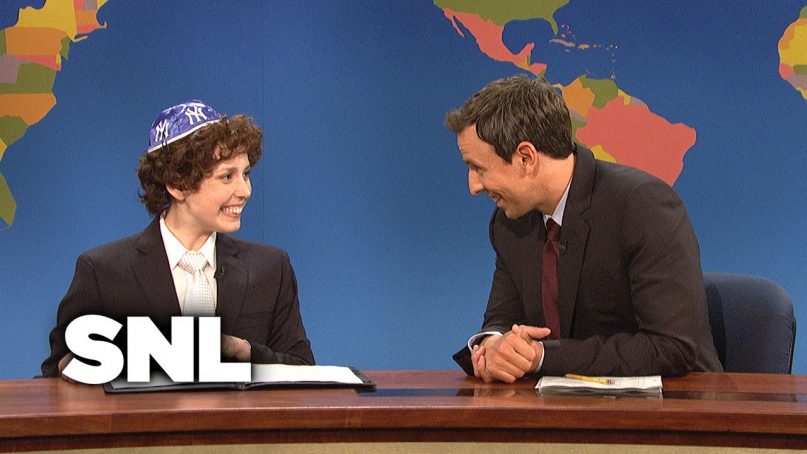 Jacob the bar mitzvah boy, played by Vanessa Bayer, with Seth Meyers.