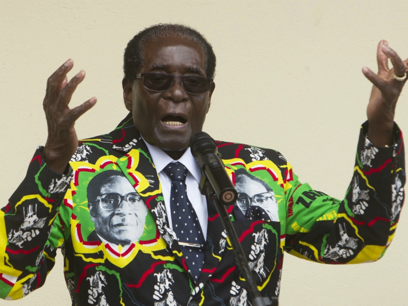 In this Dec. 17, 2016, file photo, Zimbabwean President Robert Mugabe addresses people at an event before the closure of his party's 16th Annual People's Conference in Masvingo, south of the capital, Harare. (AP Photo/Tsvangirayi Mukwazhi, File)