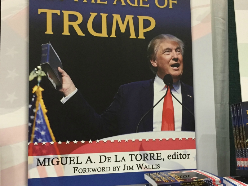 The essay collection “Faith and Resistance in the Age of Trump” was a hot seller at publishers’ exhibition hall at the annual meeting of the American Academy of Religion/Society of Biblical Literacy in Boston. RNS photo by Cathy Lynn Grossman