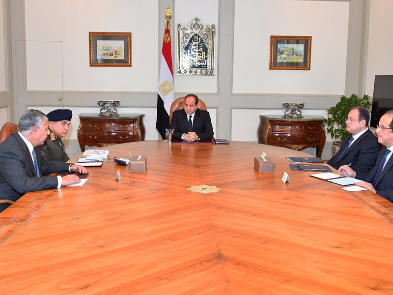 This photo released by Egypt's Presidency shows Abdel-Fattah El-Sissi, center, meeting with officials in Cairo after militants attacked a crowded mosque during Friday prayers in the Sinai Peninsula. The attackers set off explosives, spraying worshippers with gunfire and killing at least 200 people in the deadliest ever attack on Egyptian civilians by Islamic extremists. (Egyptian Presidency via AP)