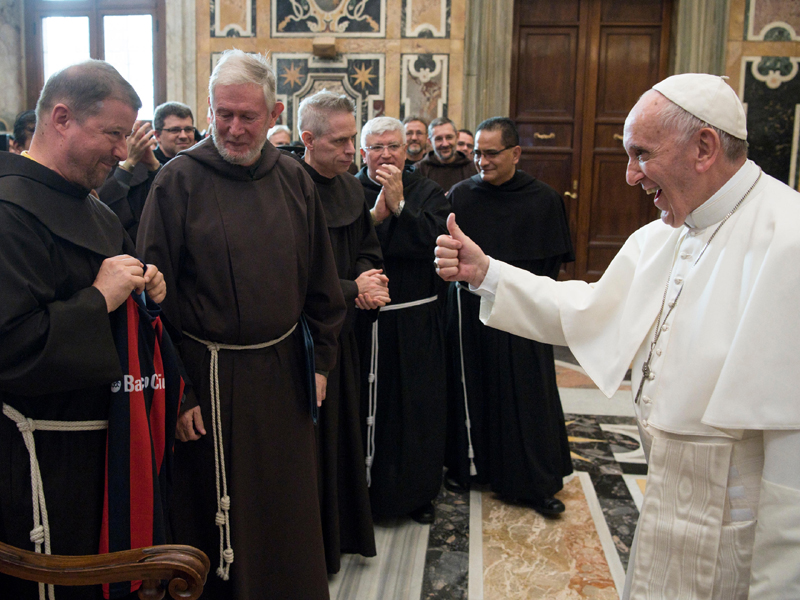 Pope Francis receives a delegation of Franciscan monks during a private audience at the Vatican Thursday, Nov. 23, 2017. (L'Osservatore Romano/Pool Photo via AP)