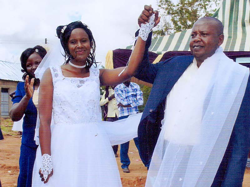 Pastor Samson Mulinge Mutuse pose for a photograph after his wedding to Evelyn Mueni at the deliverance church in Nthange, Kibwezi area on November 25.
RNS photo by Fredrick Nzwili