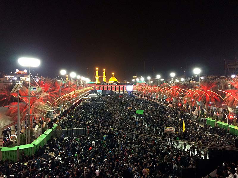 Shiite Muslim worshippers gather Nov. 9, 2017, in front of the holy shrine of Imam Hussein, in the background, during the Muslim festival of Arbaeen in Karbala, 50 miles south of Baghdad. The holiday marks the end of the 40-day mourning period after the anniversary of the seventh-century martyrdom of Imam Hussein, the Prophet Muhammad's grandson. (AP Photo/Hadi Mizban)
