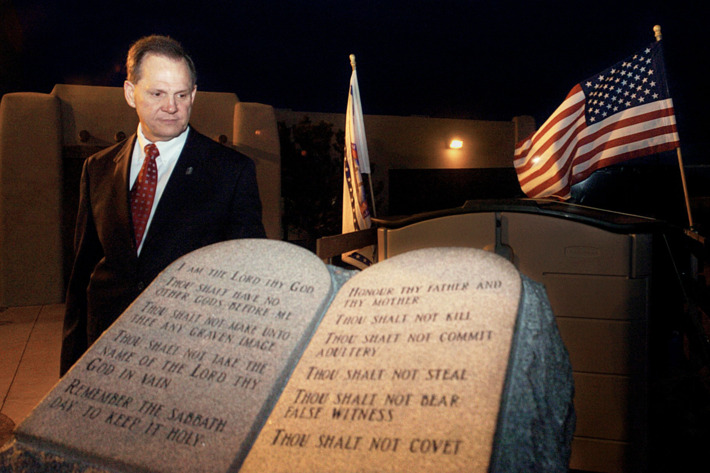 Roy Moore and the Ten Commandments monument that he had placed in the Alabama state judicial building.