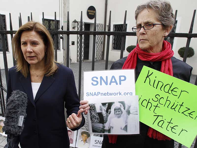 Barbara Blaine, left, president of the Survivors Network of those Abused by Priests, and Barbara Dorris protest in front of the diocesan authorities headquarter in Munich, southern Germany, on Monday, March 22, 2010. The members of a U.S.-based group arrived in Munich that day to encourage more victims in Germany to come forward.  