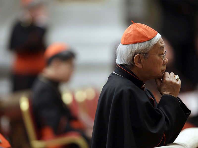 In this March 6, 2013, file photo, Cardinal Joseph Zen prays in St. Peter's Basilica during a vespers celebration at the Vatican. Hong Kong’s retired cardinal has revealed the behind-the-scenes drama of the Vatican's efforts to improve relations with China, including its request for a legitimate bishop to resign in favor of an excommunicated one who is recognized by Beijing. Zen, a vocal opponent of Pope Francis' opening to China, bitterly criticized the changing of the guard in Shantou Diocese and said in a Facebook post Jan. 29, 2018, that he traveled to the Vatican on Jan. 10 to discuss it with the pope. (AP Photo/Gregorio Borgia, file; caption amended by RNS)