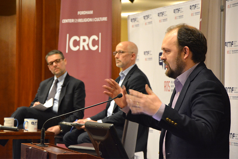 Ross Douthat, right, speaks during the Francis@Five public debate with Massimo Faggioli, left, moderator David Gibson, center, at Lincoln Center in New York on Jan. 31, 2018.  Francis@Five was presented by Religion News Foundation and The Center on Religion and Culture at Fordham University with Salt + Light media partner.  RNS photo by Jack Jenkins
