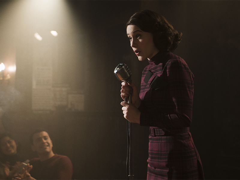 Rachel Brosnahan performs stand-up as Miriam (aka Midge) Maisel in “The Marvelous Mrs. Maisel.” Photo by Nicole Rivelli/Amazon