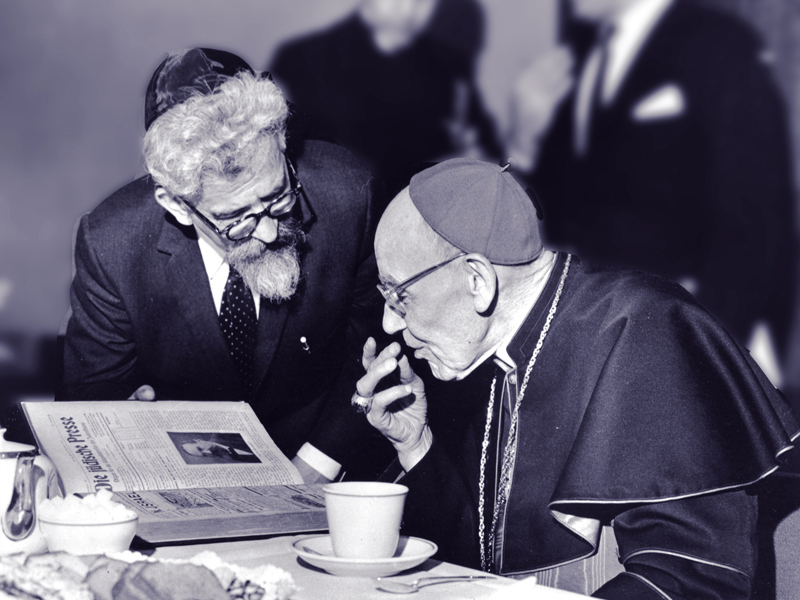 Rabbi Abraham Joshua Heschel meeting in New York with Cardinal Augustin Bea, who shepherded the process of Catholic introspection that led to Nostra Aetate, on March 31, 1963. Photo courtesy of American Jewish Committee