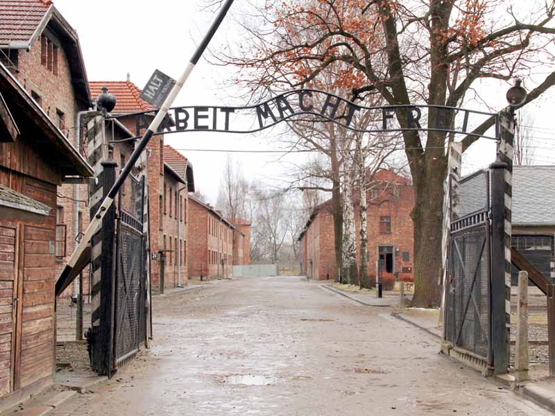 The gate of Auschwitz. Credit: Taiftin, via Shutterstock