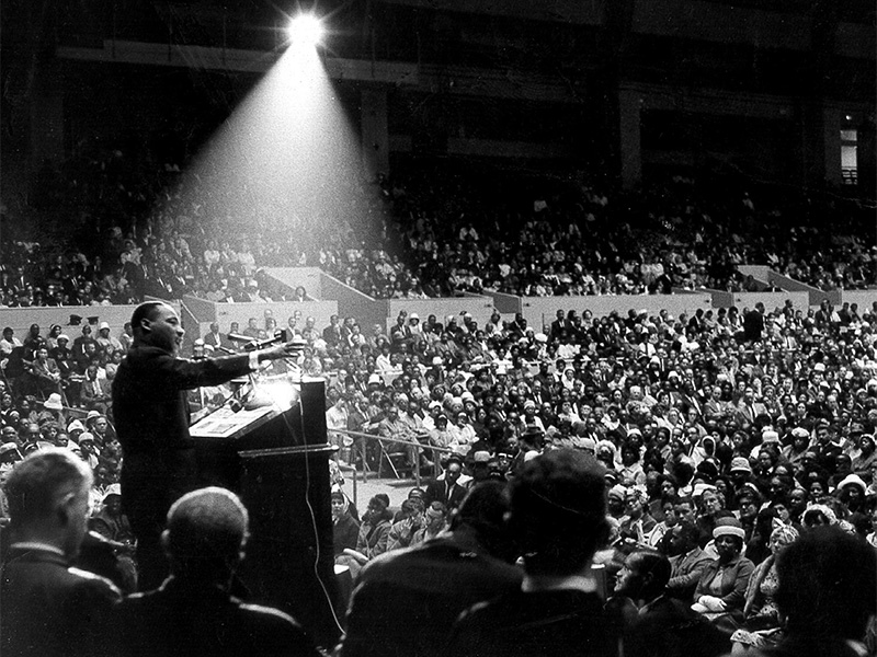 The Rev. Martin Luther King Jr. speaks at an interfaith civil rights rally at the Cow Palace in San Francisco on June 30, 1964. Photo by George Conklin/Creative Commons