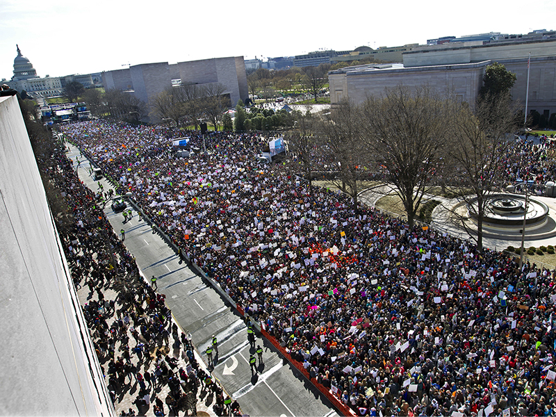 Protesters fill Pennsylvania Avenue, as seen from the Newseum, during the March for Our Lives rally in support of gun control in Washington, on March 24, 2018. (AP Photo/Jose Luis Magana)