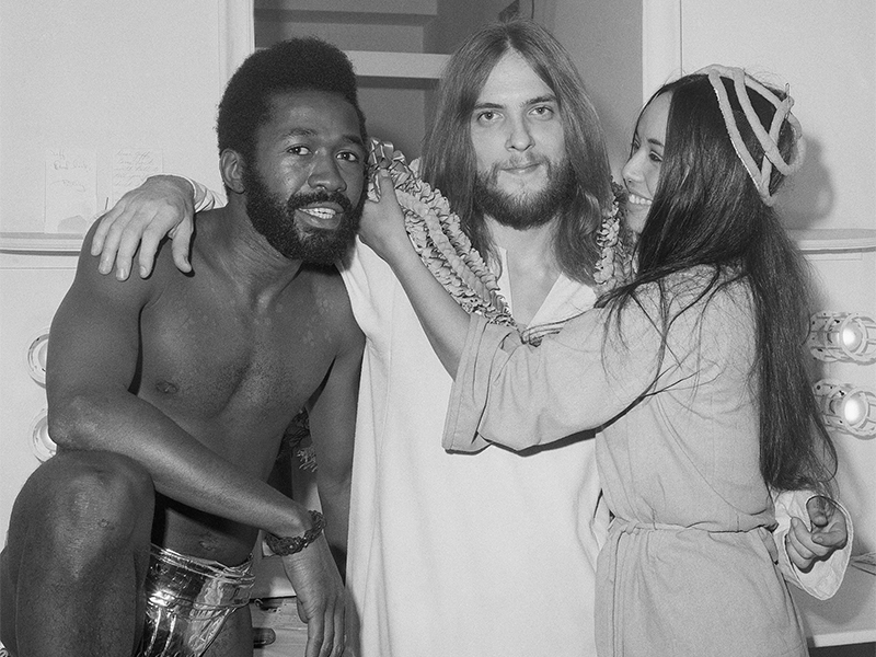 Rock opera “Jesus Christ Superstar” opened in New York  on Oct. 13, 1971, at the Mark Hellinger Theatre.  Stars Ben Vereen, from left, as Judas, Jeff Fenholt, as Jesus, and Yvonne Elliman, as Mary Magdalene, relax backstage after a preview performance of the show Oct. 12, 1971. (AP Photo)