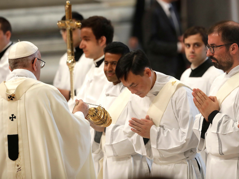 Pope Francis blesses new priests during a ceremony in St. Peter's Basilica at the Vatican, Sunday, April 22, 2018. (AP Photo/Alessandra Tarantino)